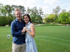 Top 5 Ways Golf Could Save Your Marriage Smiling couple posing outdoors on a golf course with green grass and trees in the background, arms around each other.